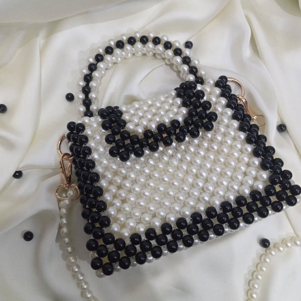 Noir and ivory pearl bag